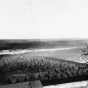 Black and white photograph of the the Dakota concentration camp on the river flats below Fort Snelling, c.1862–1863.