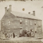 Black-and-white photo print of the Ho-Chunk (Winnebago) Indian Agency, c.1860.