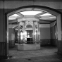 Black and white photograph of the flag case in the rotunda of the second capitol prior to demolition, 1937. Photographed by the Minneapolis Star Journal.