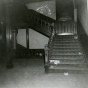 Black and white photograph of the stairway leading to the second floor of the second state capitol building prior to demolition, 1937. Photographed by A.F. Raymond.