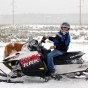 Polaris RMK series snowmobile. Introduced in 1996, the RMK series of snowmobiles Polaris’s entry into the deep snow mountain sled market. Photograph taken in Island Park, Idaho, by Flickr user MotoWebMistress. CC BY 2.0.