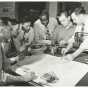 Black and white photograph of Frederick McKinley Jones and drafting team, c.1960.