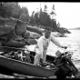 Jun Fujita boating on Rainy Lake