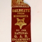 Ribbon worn by Albert Woolson at the national Grand Army of the Republic (GAR) encampment in Indianapolis held between September 13 and 18, 1942. Attached to the maroon ribbon is a matching Minnesota pin with a gopher that reads, "Minnesota in the Land of 10,000 lakes" and "The Gopher State." The ribbon was donated by his daughter, Frances Campbell, to the St. Louis County Historical Society in Duluth.