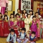 Color image of adopted Korean children in costume at Dual Heritage Conference, 1981.