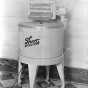 Black and white photograph of a "Thor" brand electric washing machine, ca. 1930s. Photographed by Lee Brothers.