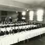 Black and white photograph of a Lions Club meeting at Northeast Neighborhood House, 1926. 