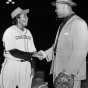 Black and white photograph of Toni Stone meeting her idol, boxer Joe Louis, c.1949.