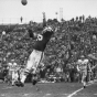 Black and white photograph of Paul Flatley catching a pass, Minnesota Vikings and Detroit Lions football game at Metropolitan Stadium Bloomington, 1963.