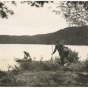 Canoers completing a portage in the Superior National Forest