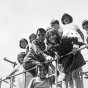 Black and white photograph of Mexican American migrant farm-worker children playing, ca. 1960. 