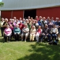 Color image of a Minnesota State Grange picnic held on the Sletton Farm in Aitkin on June 13, 2015.