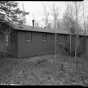 Exterior view of a barracks (Building 11), CCC Camp Rabideau F-50. Photo by Jerry Mathiason, 1994. From box 1 (144.G.8.4F) of Historic American Buildings Survey records related to Minnesota structures, 1882-2001, 1883. Manuscripts Collection, Minnesota Historical Society, St. Paul.