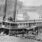 Black and white photograph of the International tied up at Moorhead,early 1870s.