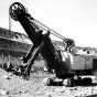 Black and white photograph of an electric shovel in operation at the Mesabi Mountain open pit mine in Franklin, ca. 1935. Photographed by Kurt B. Florman.