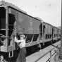 Black and white photograph of ore cars being unloaded at Dock 6 in Duluth, 1935.