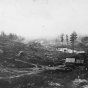 Black and white photograph of the first mine on the Mesabi Range, near Mountain Iron, ca. 1892. Photographed by Louis Perry Gallagher.