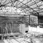 Black and white photograph of Deerwood Auditorium interior under construction, c. 1936.