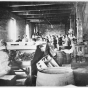 Black and white photograph of M. A. Gedney Compnay workers and vinegar barrels, c.1912.