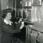 Black and white photograph of a Northwest Airlines stewardess, March 3, 1949. Photographed by Philip C. Dittes.