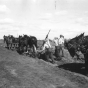 Black and white photograph of a Federal Emergency Relief Administration farm to market road construction project near Alexandria, 1936.