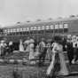 Black and white photograph of the arrival of one of the picnic trains of the Dan Patch Electric Line at Antlers Park, c.1912. 