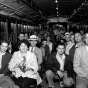 Black and white photograph of passengers on the last Minneapolis streetcar run, June 18, 1854. Photographed by St. Paul Dispatch & Pioneer Press. 