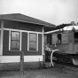 Black and white photograph of the last run of passenger service on the Minneapolis, Northfield and Southern Railway at the station for Lakeville, 1942. 