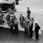 Black and white photograph of police with guns on a Minneapolis street during the strike, 1934.