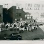 Crowd demonstrating in front of the Minneapolis sewing project