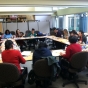 Color image of a meeting of the Hmong Health Care Professionals Coalition, 2013.