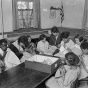 Black and white photograph of members of a sewing class at St. Paul’s Neighborhood House, c.1920.