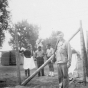 Black and white photograph of Harvey Fleshner guarding German prisoners of war in Moorhead, ca. 1943–1945.