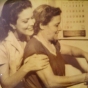 Black and white photograph of Hilda Simms with her mother, Lydia Moses during a photo shoot for Life Magazine, c.1950.