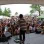 Color image of Hmong recording artists Kong and Shu perform at the 11th Annual Hmong Arts & Music Festival at Como Park in St. Paul, July, 2014. 