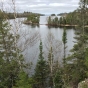 Color image of a rocky hillside and Lake Vermilion. Photograph by Minnesota Department of Natural Resources Staff, May 22, 2014.