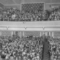 Black and white photograph of the Children at a Christmas matinee at the Grand Theater, ca. 1950s.