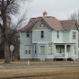 Color image of a home designed by Bert Keck for Crookston’s bandleader, G. Oliver Riggs, 2016.