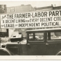 A Farmer-Labor political poster atop an automobile, ca. 1925.