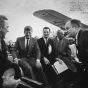 Black and white photograph of President John F. Kennedy at the Duluth airport with Senator Eugene McCarthy, Representative Donald Fraser, Governor Karl Rolvaag, and Senator Hubert H. Humphrey, 1965. 