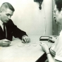 Black and white photograph of a staff member administering a vocational test at the Jewish Vocational Society of St. Paul, undated.