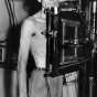 Black and white photograph of volunteer Jim Plaugher of Fresno, California, at an x-ray checkup, c.1944.