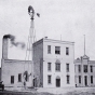 Black and white photograph of the buildings of the Kiewel Brewing Company in Crookston, ca. 1910s