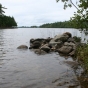 Color image looking west towards the Stuntz boathouse site, Lake Vermilion–Soudan Underground Mine State Park. Photograph by Minnesota Department of Natural Resources Staff, August 3, 2010.