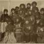 Participants in the 1916 St. Paul Winter carnival pose in their "Africa costumes."