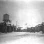 Black and white photograph of the main Street of the Milford Mining Company in Crosby, 1924.
