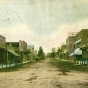 Colorized tinted photographic postcard showing Lewis Street in Watertown, c.1909.