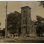 Black and white photograph of the front exterior of B'nai Abraham Congregation taken in 1922. 