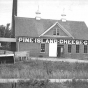 Black and white photograph of Pine Island Cheese Co., 1937. 