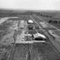 Black and white photograph of Northwest Airlines and McInnis Aviation Service hangars, Wold-Chamberlain Field, undated.